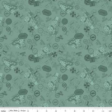 Image of Thomas & Friends™ 80th Anniversary Tonal Toss Green quilting cotton fabric by Riley Blake Official Licensed Product for Riley Blake Designs. Features train signs on a green background. Cute Little Fabric Shop