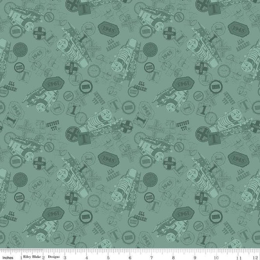 Image of Thomas & Friends™ 80th Anniversary Tonal Toss Green quilting cotton fabric by Riley Blake Official Licensed Product for Riley Blake Designs. Features train signs on a green background. Cute Little Fabric Shop