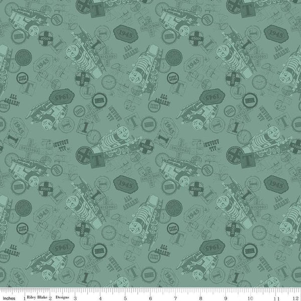 Image of Thomas & Friends™ 80th Anniversary Tonal Toss Green quilting cotton fabric by Riley Blake Official Licensed Product for Riley Blake Designs. Features train signs on a green background. Cute Little Fabric Shop