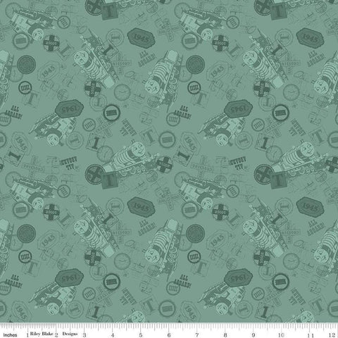 Image of Thomas & Friends™ 80th Anniversary Tonal Toss Green quilting cotton fabric by Riley Blake Official Licensed Product for Riley Blake Designs. Features train signs on a green background. Cute Little Fabric Shop