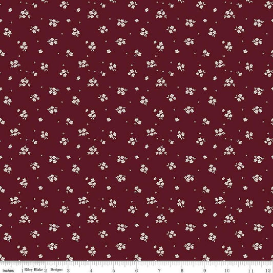 Image of Love You Always Ditsy Maroon quilting cotton fabric by Sandy Gervais for Riley Blake Designs. Features flowers on a red background. Cute Little Fabric Shop