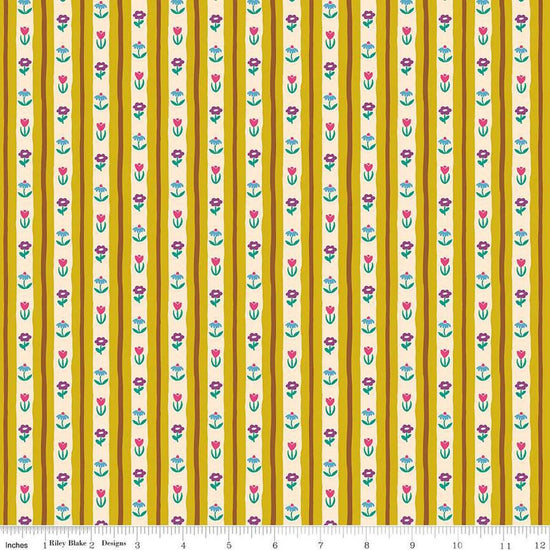 Image of The Genesis of a Journey Bavarian Curry quilting cotton fabric by Genesis Hall for Riley Blake Designs. Features stripes on a yellow background. Cute Little Fabric Shop