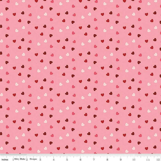 Image of Sew In Love Hearts Rose quilting cotton fabric by Dan Mogstad for Riley Blake Designs. Features hearts on a pink background. Cute Little Fabric Shop