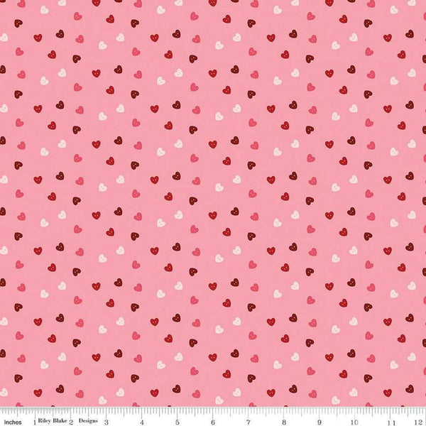 Image of Sew In Love Hearts Rose quilting cotton fabric by Dan Mogstad for Riley Blake Designs. Features hearts on a pink background. Cute Little Fabric Shop