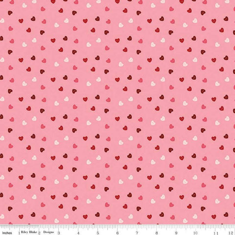 Image of Sew In Love Hearts Rose quilting cotton fabric by Dan Mogstad for Riley Blake Designs. Features hearts on a pink background. Cute Little Fabric Shop