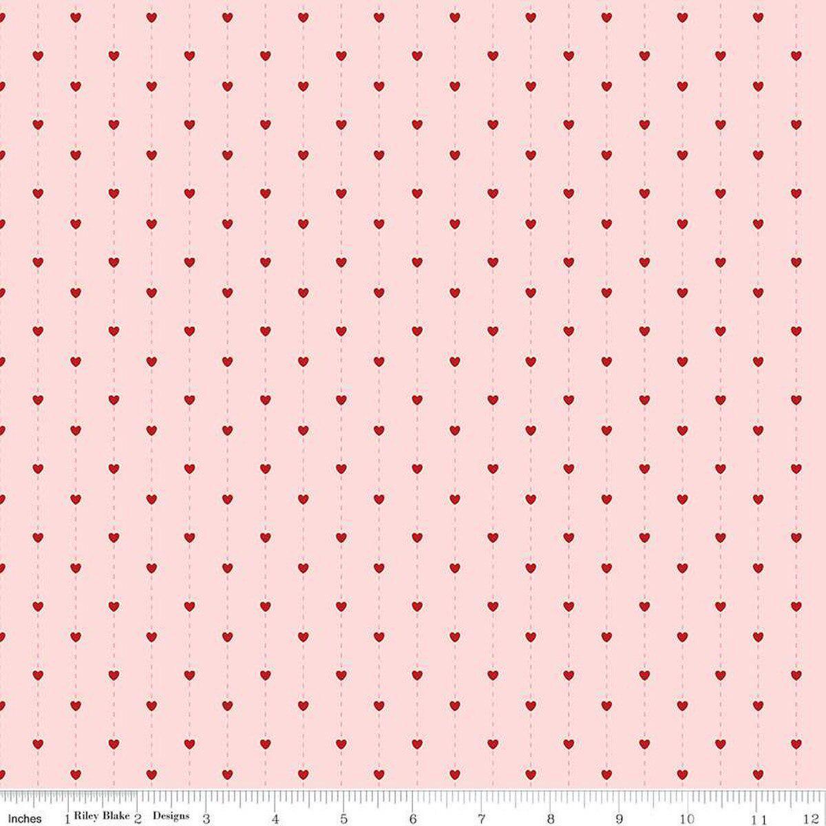 Image of Sew In Love Stripes Blush quilting cotton fabric by Dan Mogstad for Riley Blake Designs. Features stripes on a pink background. Cute Little Fabric Shop