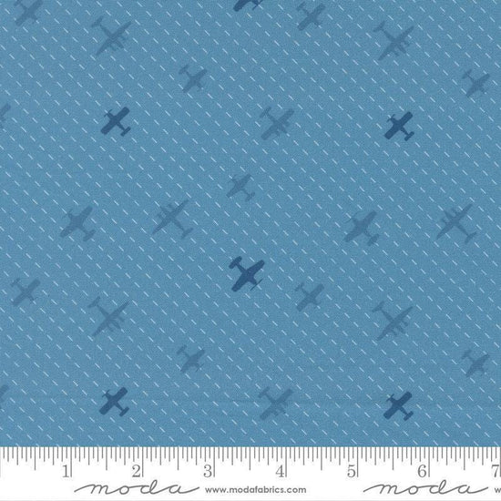 Image of High Flight Airplanes Lake quilting cotton fabric by Sariditty for Moda Fabric. Features airplanes on a blue background. Cute Little Fabric Shop