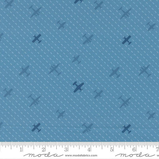 Image of High Flight Airplanes Lake quilting cotton fabric by Sariditty for Moda Fabric. Features airplanes on a blue background. Cute Little Fabric Shop