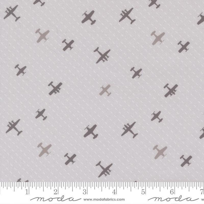 Image of High Flight Airplanes Smoke quilting cotton fabric by Sariditty for Moda Fabric. Features airplanes on a gray background. Cute Little Fabric Shop