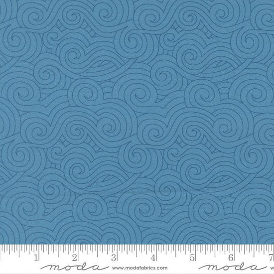 Image of High Flight Swirls Lake quilting cotton fabric by Sariditty for Moda Fabric. Features swirls on a blue background. Cute Little Fabric Shop