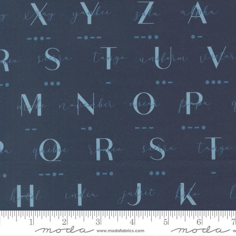 Image of High Flight Morse Navy quilting cotton fabric by Sariditty for Moda Fabric. Features text on a blue background. Cute Little Fabric Shop