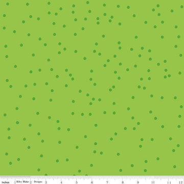 Image of On The Dot Kiwi quilting cotton fabric by Sew Yeah Quilting for Riley Blake Designs. Features dots on a green background. Cute Little Fabric Shop