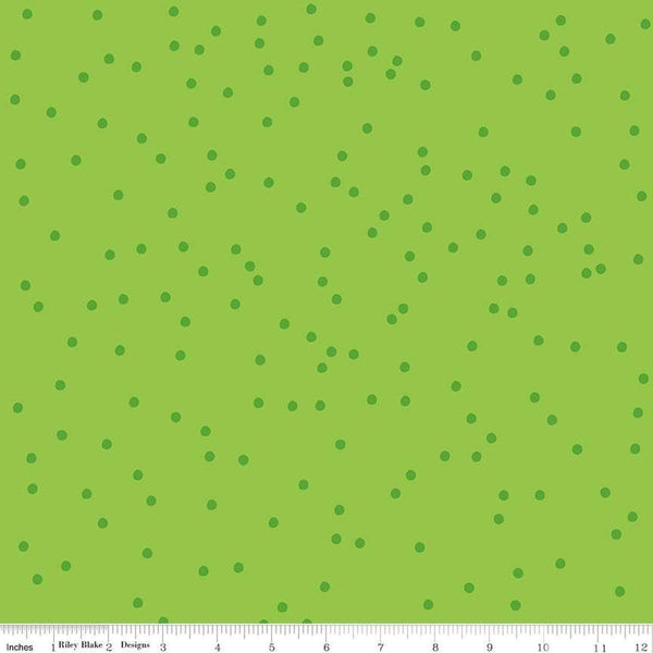 Image of On The Dot Kiwi quilting cotton fabric by Sew Yeah Quilting for Riley Blake Designs. Features dots on a green background. Cute Little Fabric Shop