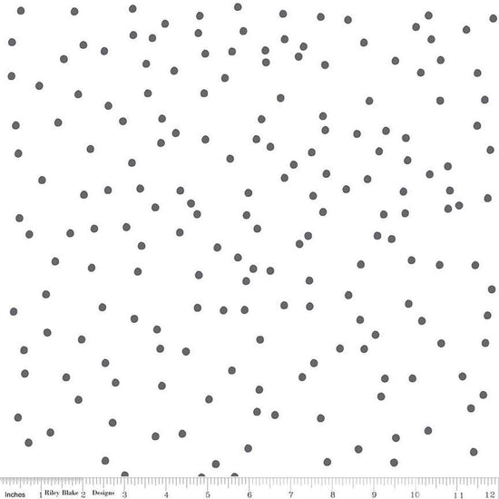 Image of On The Dot Dalmatian quilting cotton fabric by Sew Yeah Quilting for Riley Blake Designs. Features dots on a white background. Cute Little Fabric Shop