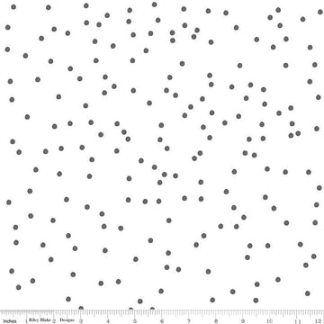 Image of On The Dot Dalmatian quilting cotton fabric by Sew Yeah Quilting for Riley Blake Designs. Features dots on a white background. Cute Little Fabric Shop