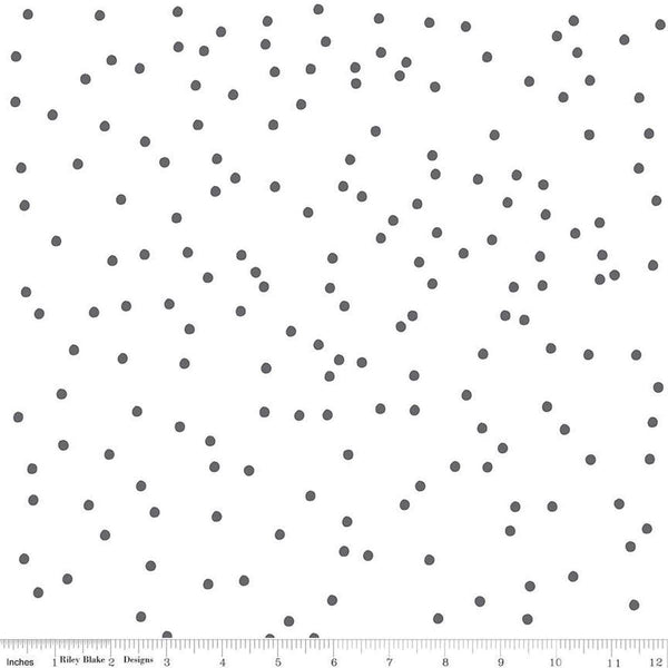 Image of On The Dot Dalmatian quilting cotton fabric by Sew Yeah Quilting for Riley Blake Designs. Features dots on a white background. Cute Little Fabric Shop