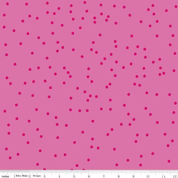 Image of On The Dot Bubblegum quilting cotton fabric by Sew Yeah Quilting for Riley Blake Designs. Features dots on a pink background. Cute Little Fabric Shop
