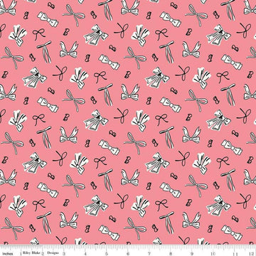 Image of Barbie™ Vintage Bows Pink quilting cotton fabric by Official Licensed Product for Riley Blake Designs. Features bows on a pink background. Cute Little Fabric Shop