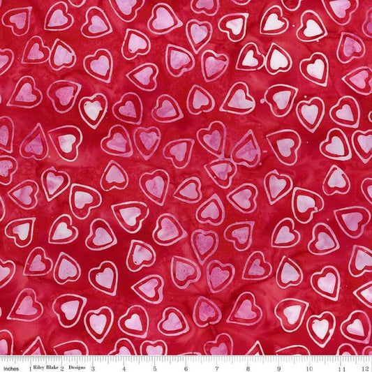 Image of Expressions Batiks Love Punch Red Candy Riot quilting cotton fabric by The RBD Designers for Riley Blake Designs. Features hearts on a red background. Cute Little Fabric Shop