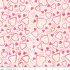 Image of Expressions Batiks Love Punch Piggy Bank quilting cotton fabric by The RBD Designers for Riley Blake Designs. Features hearts on a cream background. Cute Little Fabric Shop