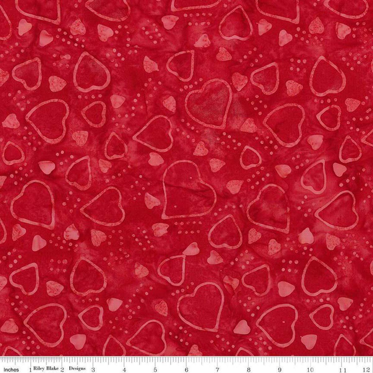 Image of Expressions Batiks Love Punch Red Red quilting cotton fabric by The RBD Designers for Riley Blake Designs. Features hearts on a red background. Cute Little Fabric Shop