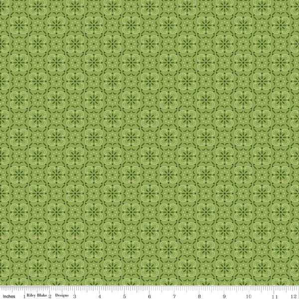 Image of Farmer's Daughter Bandana Thyme quilting cotton fabric by Lori Holt for Riley Blake Designs. Features medallions on a green background. Cute Little Fabric Shop