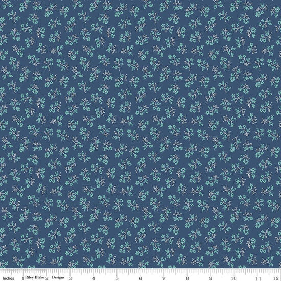 Image of Farmer's Daughter Vintage Denim quilting cotton fabric by Lori Holt for Riley Blake Designs. Features flowers on a blue background. Cute Little Fabric Shop