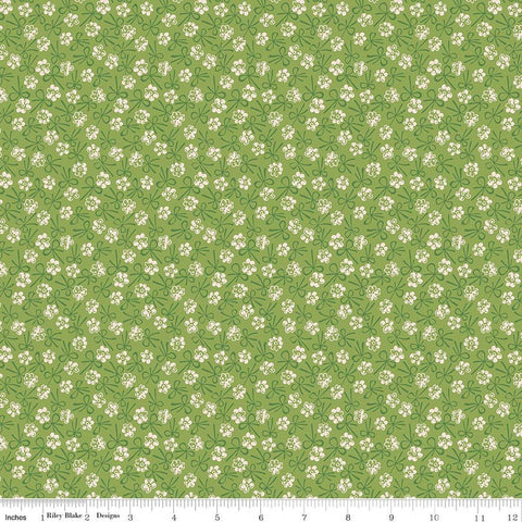 Image of Farmer's Daughter Bonnet Thyme quilting cotton fabric by Lori Holt for Riley Blake Designs. Features flowers on a green background. Cute Little Fabric Shop