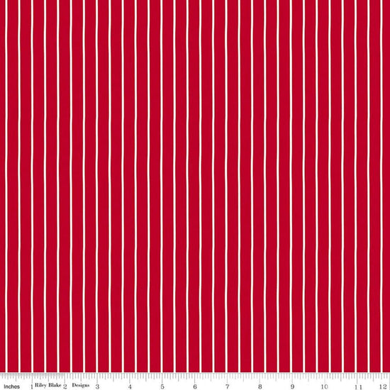 Image of Radiant Ruby Stripe Schoolhouse quilting cotton fabric by Dani Mogstad for Riley Blake Designs. Features stripes on a red background. Cute Little Fabric Shop