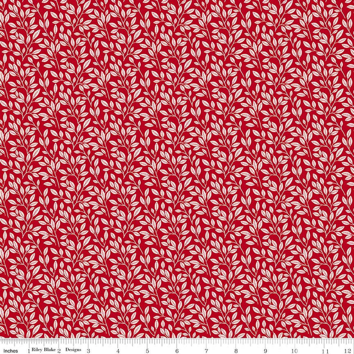 Image of Radiant Ruby Leaves Schoolhouse quilting cotton fabric by Dani Mogstad for Riley Blake Designs. Features leaves on a red background. Cute Little Fabric Shop