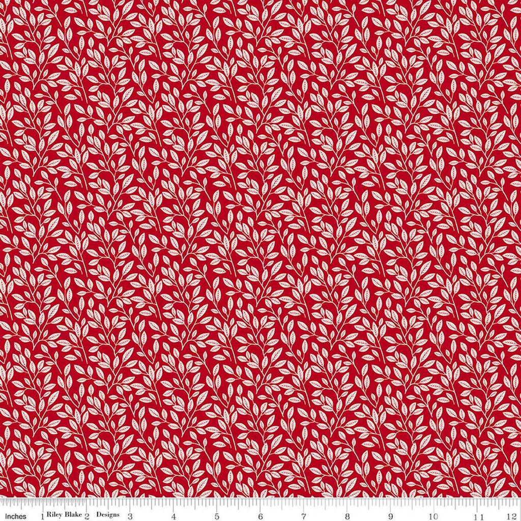 Image of Radiant Ruby Leaves Schoolhouse quilting cotton fabric by Dani Mogstad for Riley Blake Designs. Features leaves on a red background. Cute Little Fabric Shop