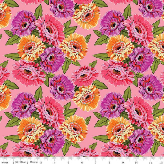 Image of Zinnias Main Pink quilting cotton fabric by Lila Tueller for Riley Blake Designs. Features flowers on pink background. Cute Little Fabric Shop