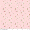 Image of Sew In Love Rosebuds Blush quilting cotton fabric by Dan Mogstad for Riley Blake Designs. Features roses on a pink background. Cute Little Fabric Shop