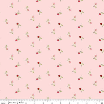 Image of Sew In Love Rosebuds Blush quilting cotton fabric by Dan Mogstad for Riley Blake Designs. Features roses on a pink background. Cute Little Fabric Shop