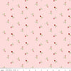 Image of Sew In Love Rosebuds Blush quilting cotton fabric by Dan Mogstad for Riley Blake Designs. Features roses on a pink background. Cute Little Fabric Shop