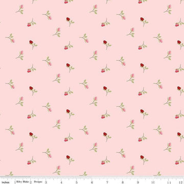 Image of Sew In Love Rosebuds Blush quilting cotton fabric by Dan Mogstad for Riley Blake Designs. Features roses on a pink background. Cute Little Fabric Shop