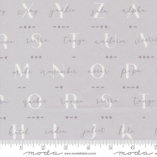 Image of High Flight Morse Smoke quilting cotton fabric by Sariditty for Moda Fabric. Features text on a gray background. Cute Little Fabric Shop