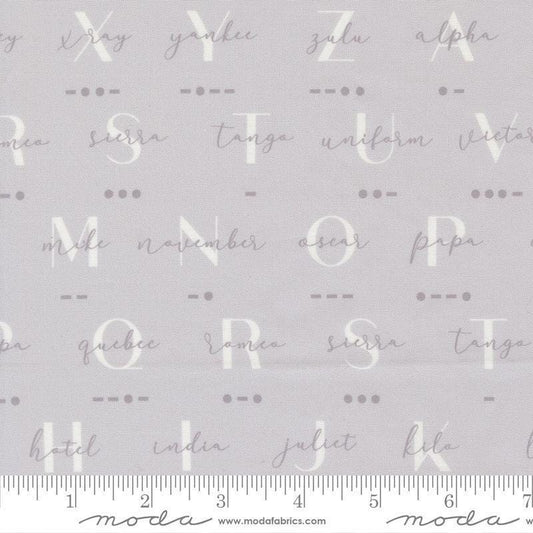 Image of High Flight Morse Smoke quilting cotton fabric by Sariditty for Moda Fabric. Features text on a gray background. Cute Little Fabric Shop