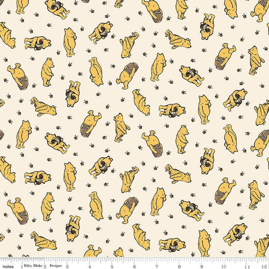 Image of Winnie the Pooh Toss Cream quilting cotton fabric by Echo Park Paper Co for Riley Blake Designs. Features Pooh on a cream background. Cute Little Fabric Shop