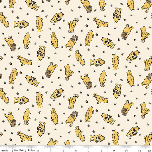 Image of Winnie the Pooh Toss Cream quilting cotton fabric by Echo Park Paper Co for Riley Blake Designs. Features Pooh on a cream background. Cute Little Fabric Shop