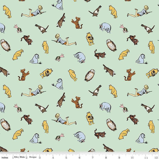 Image of Winnie the Pooh Characters Green quilting cotton fabric by Echo Park Paper Co for Riley Blake Designs. Features characters on a green background. Cute Little Fabric Shop