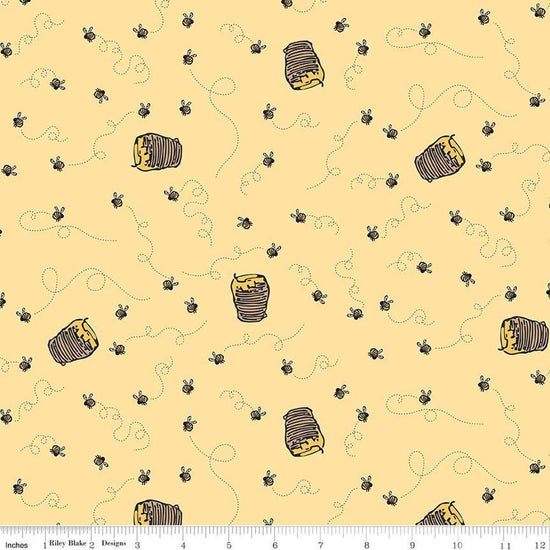 Image of Winnie the Pooh Bees Sunshine quilting cotton fabric by Echo Park Paper Co for Riley Blake Designs. Features bees on a yellow background. Cute Little Fabric Shop