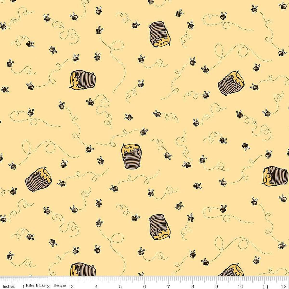 Image of Winnie the Pooh Bees Sunshine quilting cotton fabric by Echo Park Paper Co for Riley Blake Designs. Features bees on a yellow background. Cute Little Fabric Shop