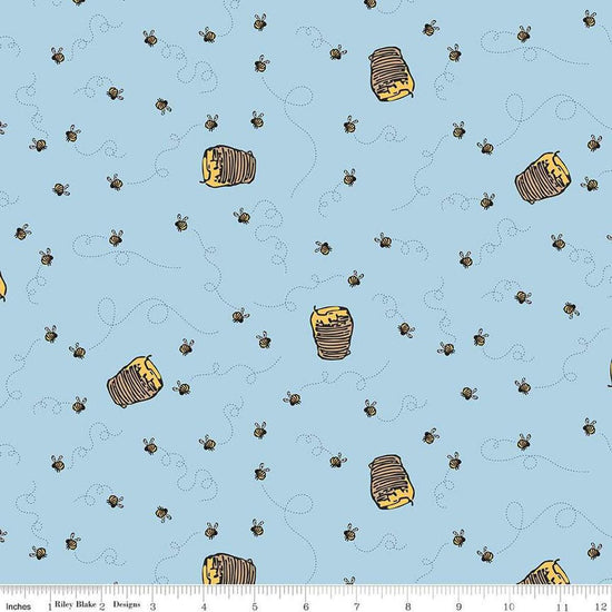 Image of Winnie the Pooh Bees Blue quilting cotton fabric by Echo Park Paper Co for Riley Blake Designs. Features bees on a blue background. Cute Little Fabric Shop