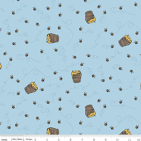 Image of Winnie the Pooh Bees Blue quilting cotton fabric by Echo Park Paper Co for Riley Blake Designs. Features bees on a blue background. Cute Little Fabric Shop