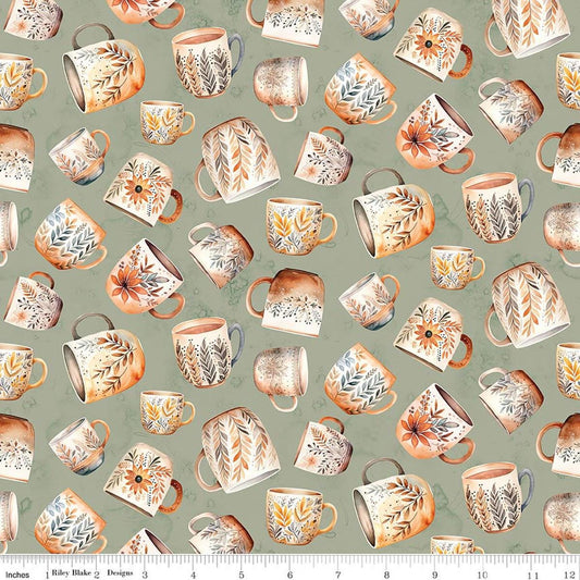 Image of Coffee Time Coffee Mugs Sage quilting cotton fabric by The RBD Designers for Riley Blake Designs. Features cups on a green background. Cute Little Fabric Shop
