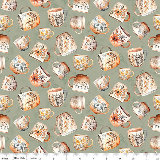 Image of Coffee Time Coffee Mugs Sage quilting cotton fabric by The RBD Designers for Riley Blake Designs. Features cups on a green background. Cute Little Fabric Shop