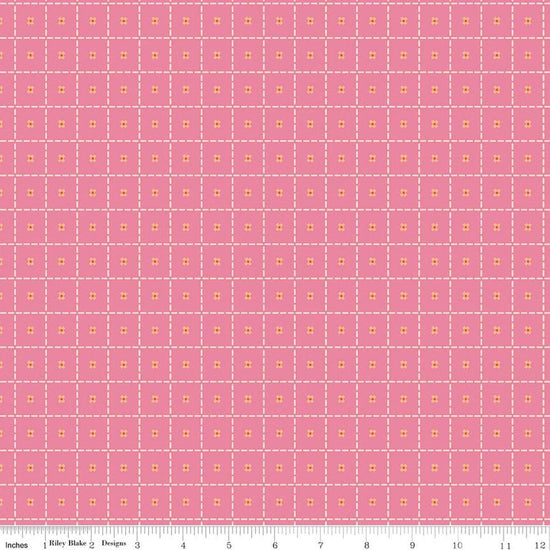 Image of Patchwork Stiches Pink quilting cotton fabric by Liza Taylor for Riley Blake Designs. Features squares on a pink background. Cute Little Fabric Shop