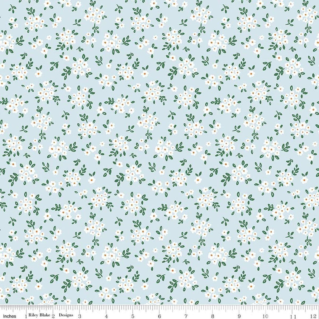Image of Sweet Cotton Tales Blooming Bliss Powder quilting cotton fabric by Cayla Naylor for Riley Blake Designs. Features flowers on a blue background. Cute Little Fabric Shop
