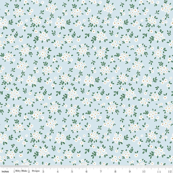 Image of Sweet Cotton Tales Blooming Bliss Powder quilting cotton fabric by Cayla Naylor for Riley Blake Designs. Features flowers on a blue background. Cute Little Fabric Shop